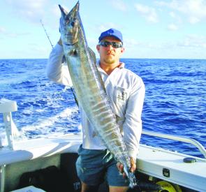 Andy Williams with his first wahoo caught on a high-speed hot pink skirted lure.